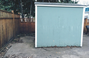 Irvington backyard shed required in new landscape design.