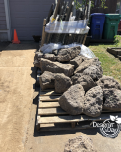 Woodlawn home gets Mossy rock delivery for new landscape