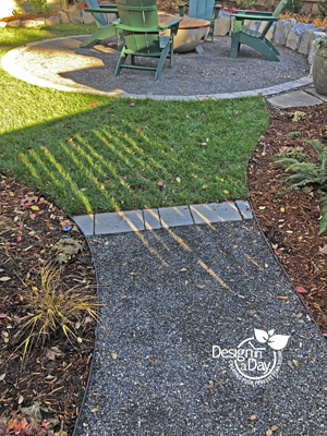 Repeating hardscape landscaping materials helps to integrate a small city property