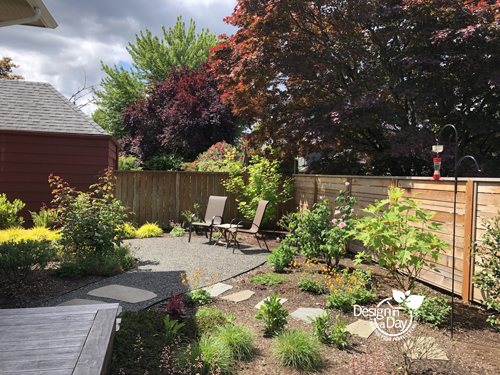 Laurelhurst home landscape design creates sitting area and room for gardeners plantsplants.
