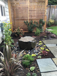 Echo Chamber water feature in NE Portland designed by Landscape Design in a Day and D and J Landscape Contracting for people and family dog.
