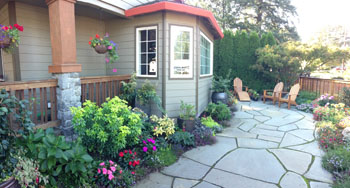 Janet loves sitting out in her patio garden and also seeing the color explosion from her dining nook.