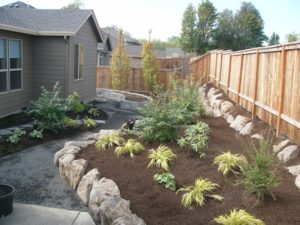 Landscape design solves drainage problems in Salmon Creek back yard.