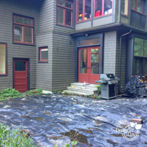 Before photo of Hardscape Landscape Design in Willamette Heights shows yards of black plastic.